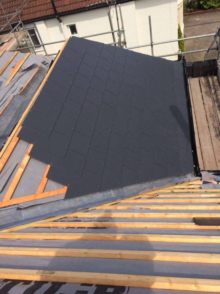 tiled roof being built