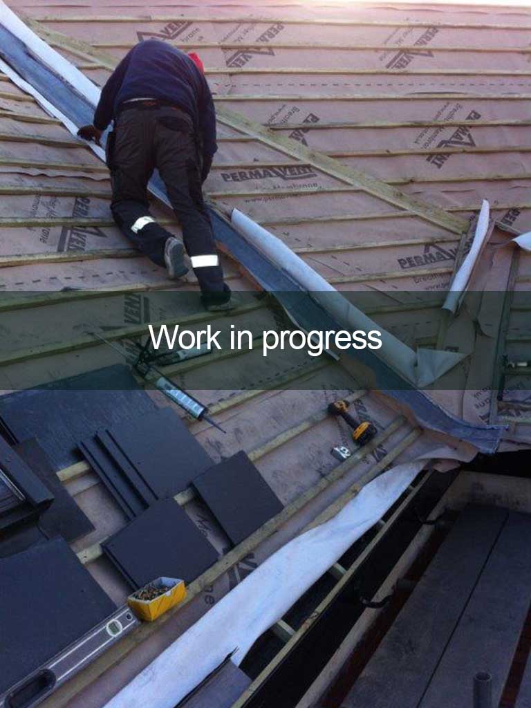 roofer installing a new roof